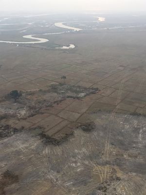 Foto udara ini diambil pada 9 Februari 2018 menunjukkan desa warga etnis Rshingya yang sudah diratakan dengan buldoser di Myanmar. (AFP)