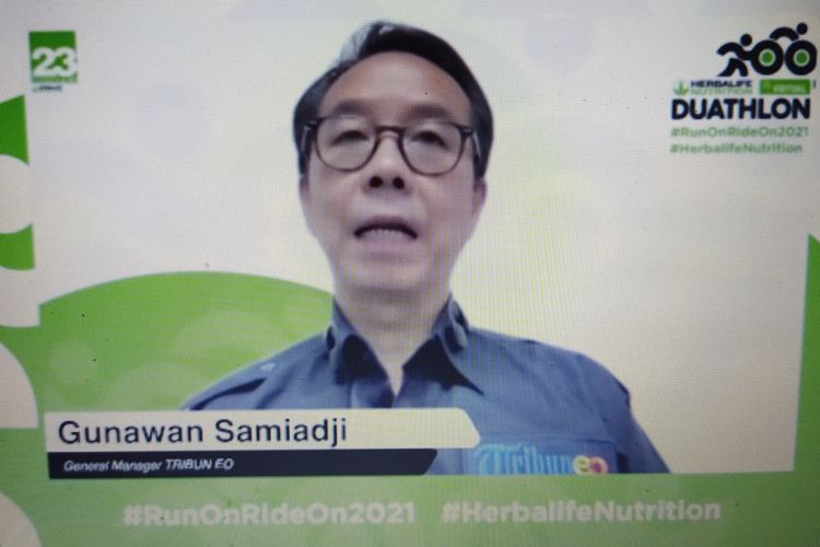 Tangkapan layar General Manajer Tribun EO Gunawan Samiadji dalam jumpa pers daring  Herbalife Nutrition Virtual Duathlon 2021, Jumat (11/12/2021).