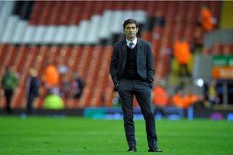 Ekspresi pelatih Villarreal, Marcelino Garcia Toral, setelah timnya kalah 0-3 dari Liverpool pada semifinal kedua Liga Europa di Stadion Anfield, Kamis (5/5/2016).