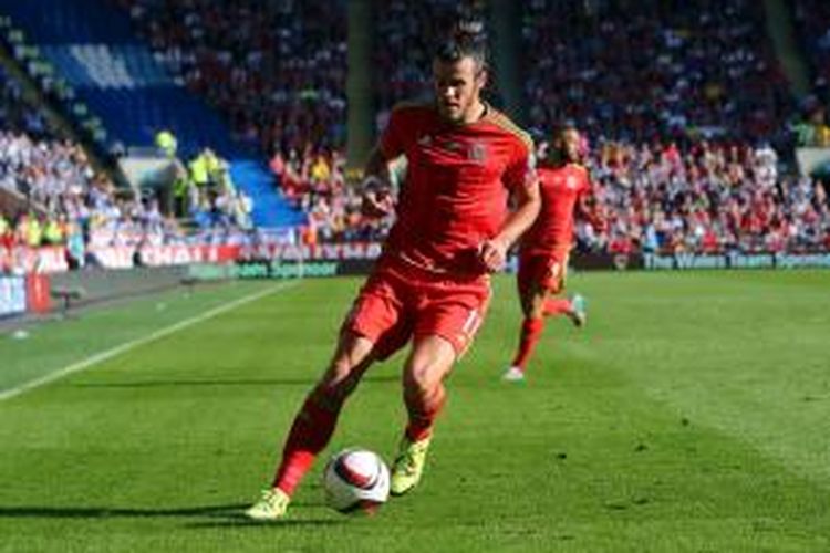 Bomber tim nasional Wales, Gareth Bale, saat menghadapi Israel pada laga lanjutan Grup B Kualifikasi Piala Eropa 2016 di Stadion Cardiff City, Minggu atau Senin (7/9/2015) dini hari WIB. 