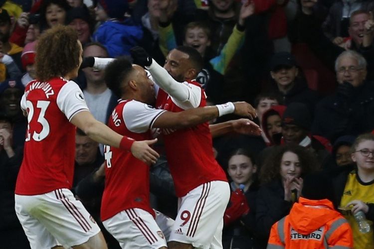 Pierre-Emerick Aubameyang merayakan golnya pada pertandingan Arsenal vs Wolverhampton Wanderers dalam lanjutan Liga Inggris di Stadion Emirates, 2 November 2019. 