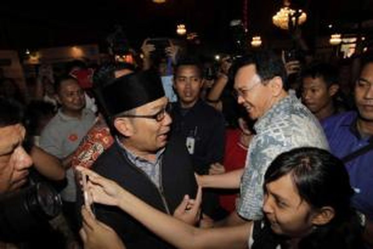 Gubernur DKI Jakarta Basuki Tjahaja Purnama dan Walikota Bandung Ridwan Kamil menjadi pembicara di acara Kompasianival 2014 di Gedung Sasono, Taman Mini Indonesia Indah, Jakarta, Sabtu (22/11/2014). Acara yang berlangsung hingga pukul 22.00 ini menghadirkan puluhan komunitas, grup band hingga sejumlah pembicara. 