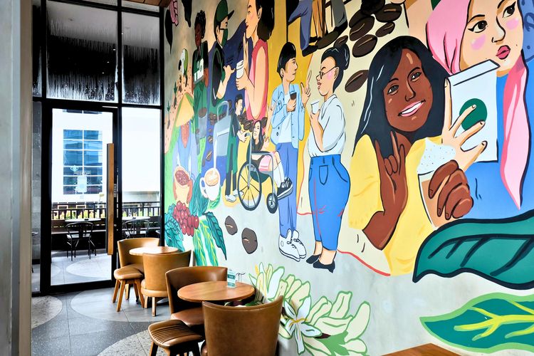 Mural di dinding  Starbucks Signing Store Tata Puri, Jakarta, dibuat oleh seniman teman Tuli, Indira Natalia.