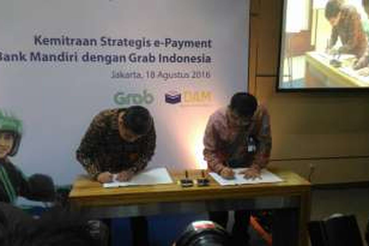  Penandatanganan Kerja Sama Sistem Pembayaran antara Bank Mandiri dengan Grab Indonesia, di Plaza Mandiri, Jakarta, (18/8/2016)