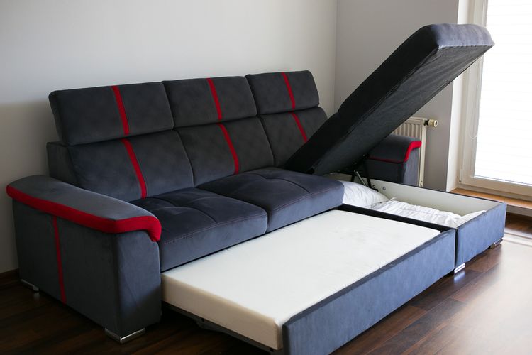 Ilustrasi sofa bed dengan penyimpanan.