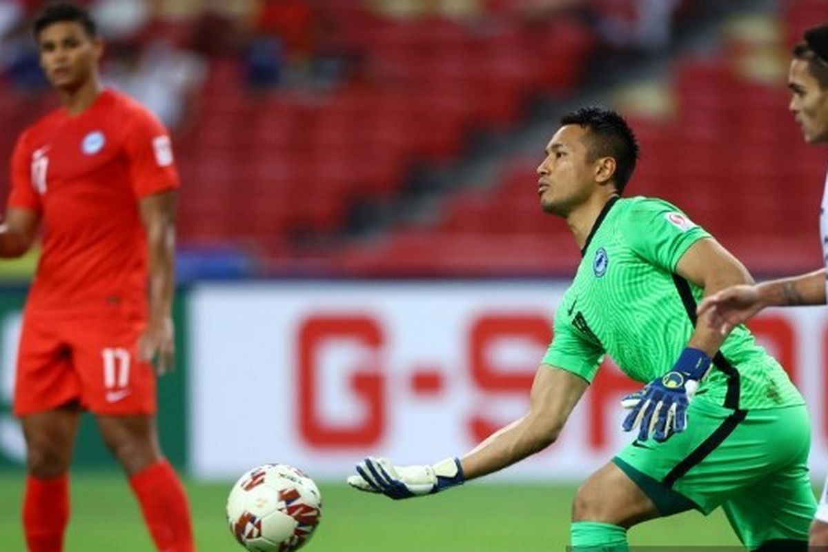 Penampilan Hassan Sunny dalam pertandingan fase Grup A Piala AFF 2020 Singapura vs Timor Leste di National Stadium, Singapura, 14 Desember 2021.
