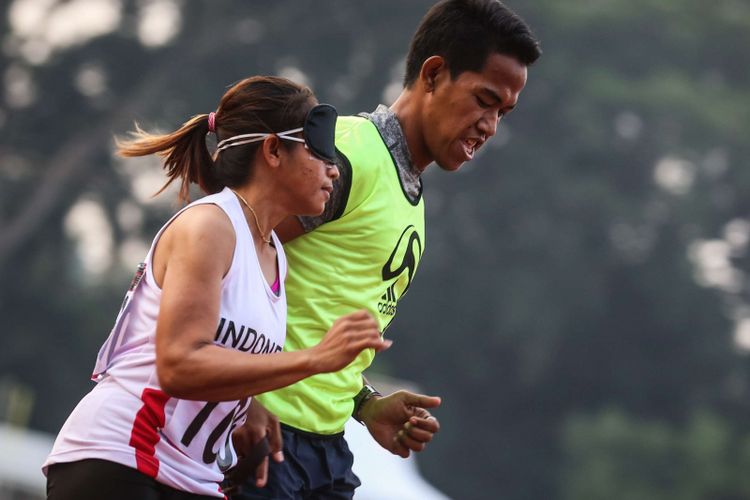 Atlet difabel Lari Indonesia, Unggu Susan beraksi saat test event Para Games Invitational Tournament di Stadion Madya Kawasan Gelora Bung Karno, Senayan, Jakarta Pusat, Sabtu (30/6/2018).