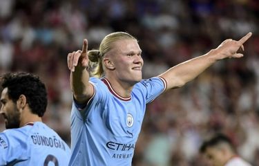 Erling Haaland merayakan gol kedua yang ia cetak dalam laga Sevilla vs Manchester City pada matchday pertama Liga Champions 2022-2023 yang digelar di Stadion Ramon Sanchez Pizjuan, Rabu (7/9/2022) dini hari WIB.