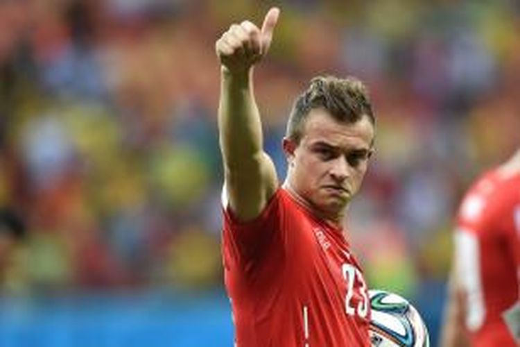 Penyerang Swiss, Xherdan Shaqiri, merayakan kemenangan timnya 3-0 atas Honduras, pada laga terakhir Grup E, di Arena Amazonia, Manaus, Rabu (25/6/2014). Tiga gol Swiss dicetak oleh Shaqiri.