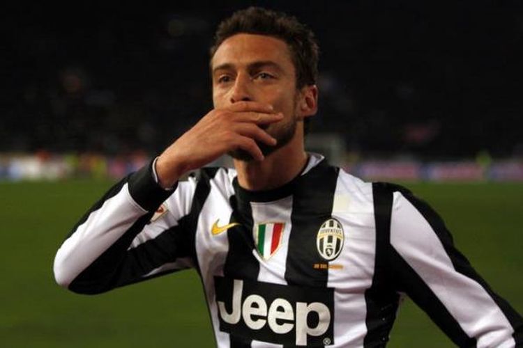 Claudio Marchisio merayakan gollnya ke gawang Bologna dalam laga Serie-A di Stadion Renato DallAra, Sabtu (16/3/2013). Juventus akhirnya menang 2-0. 