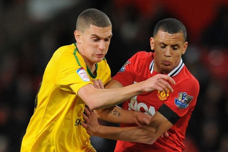 Ravel Morrison beraksi bagi Manchester United pada 2011.