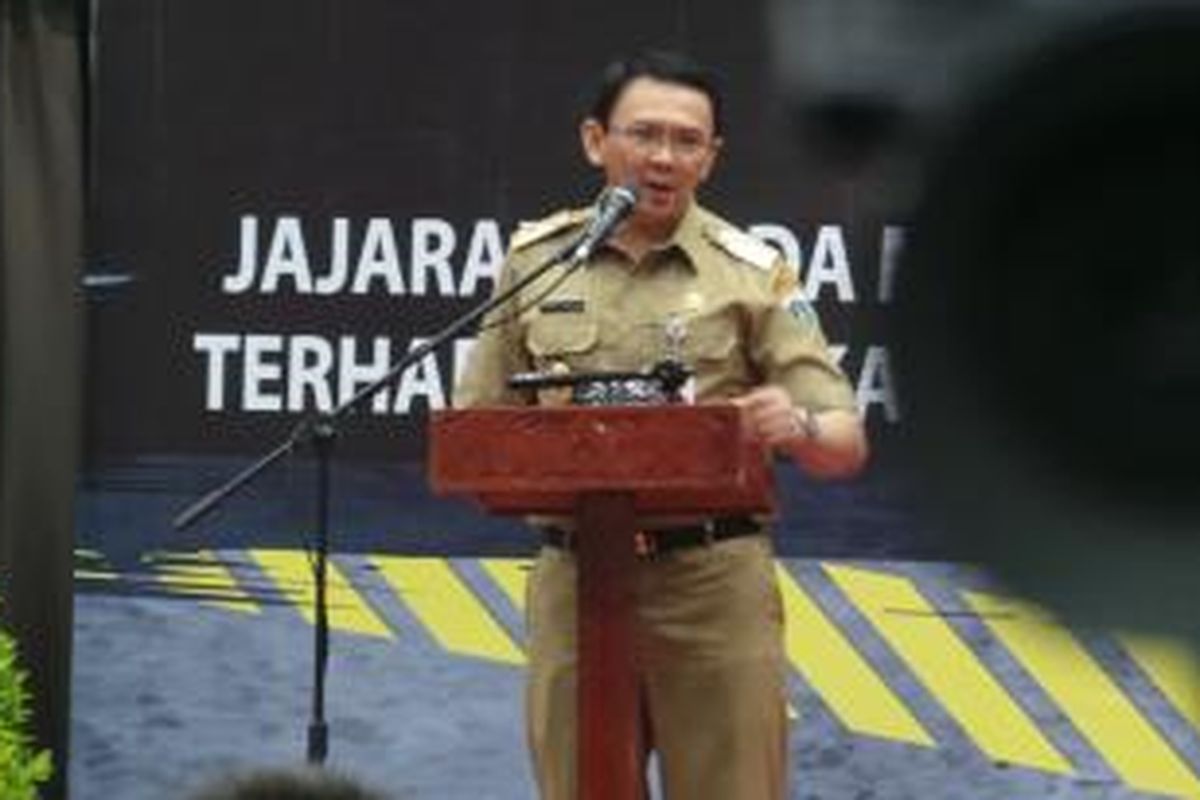 Wakil Gubernur DKI Jakarta Basuki Tjahaja Purnama saat memberikan arahan kepada ribuan personel reserse (intel) Polda Metro Jaya, di Ecovention Park Ancol, Jakarta, Selasa (14/10/2014).