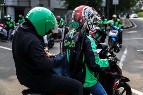 Cegah Penularan Covid-19, Pengemudi Ojek Pakai Partisi hingga Beri Masker