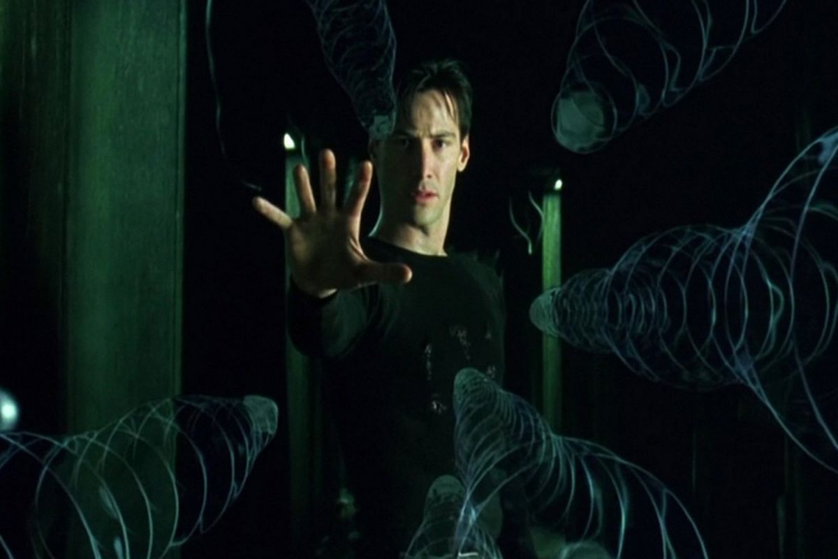 Keanu Reeves beraksi dalam The Matrix (1999)