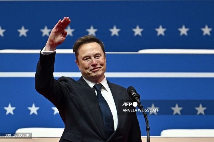 Tesla and SpaceX CEO Elon Musk gestures as he speaks during the inaugural parade inside Capitol One Arena, in Washington, DC, on January 20, 2025. (Photo by ANGELA WEISS / AFP)