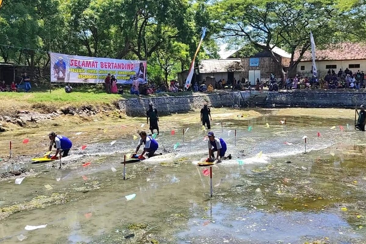 Tradisi Skilot di Pasuruan, Selancar di Atas Lumpur saat Rayakan Hari Raya Ketupat 