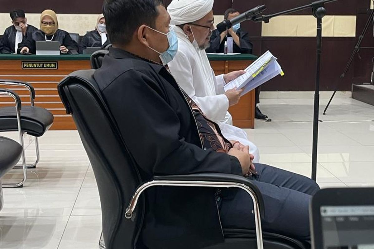 Rizieq Shihab ketika membacakan pleidoi atau nota pembelaan terkait kasus tes usap RS Ummi Bogor yang menjeratnya, Kamis (10/6/2021).