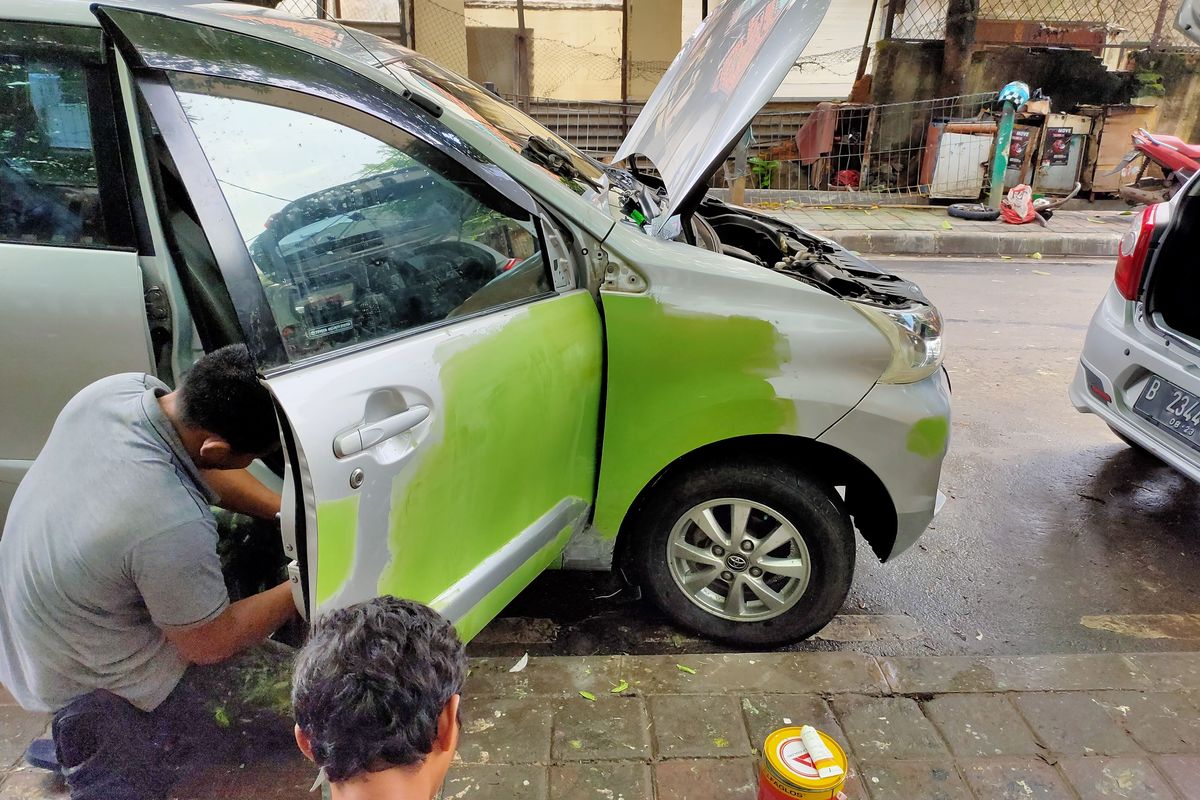 perbaikan bodi pinggir jalan