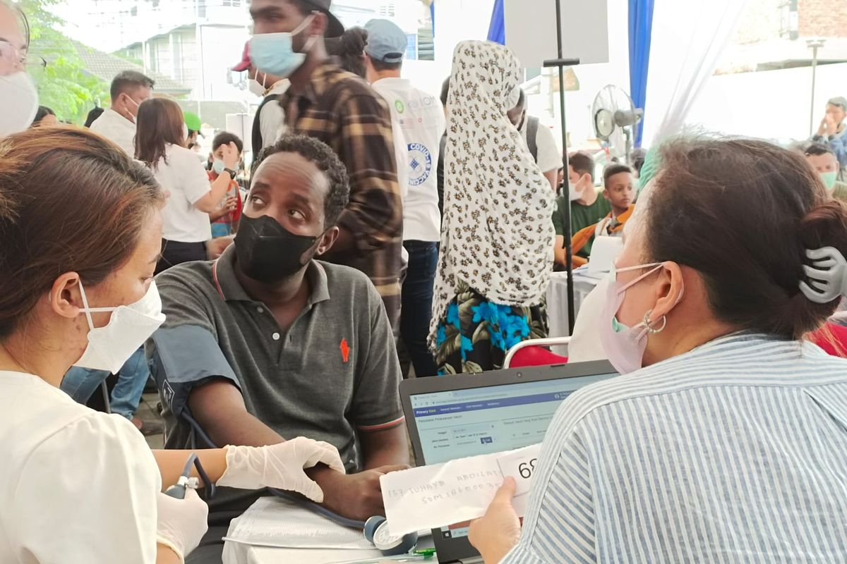 About 1,300 refugees from various countries living in Medan, North Sumatera get their Covid-19 vaccine.  