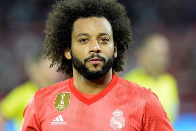 Bek sayap Real Madrid, Marcelo, beraksi dalam partai Liga Spanyol melawan Sevilla di Stadion Ramon Sanchez Pizjuan, Sevilla, 26 September 2018.
