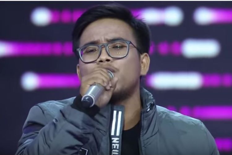 Kontestan The Voice Indonesia, Genya, yang berhasil menipu para juri, Armand Maulana, Isyana Sarasvati, Nino RAN, Vidi Aldiano, dan Titi DJ. Genya berhasil masuk tim Titi DJ.