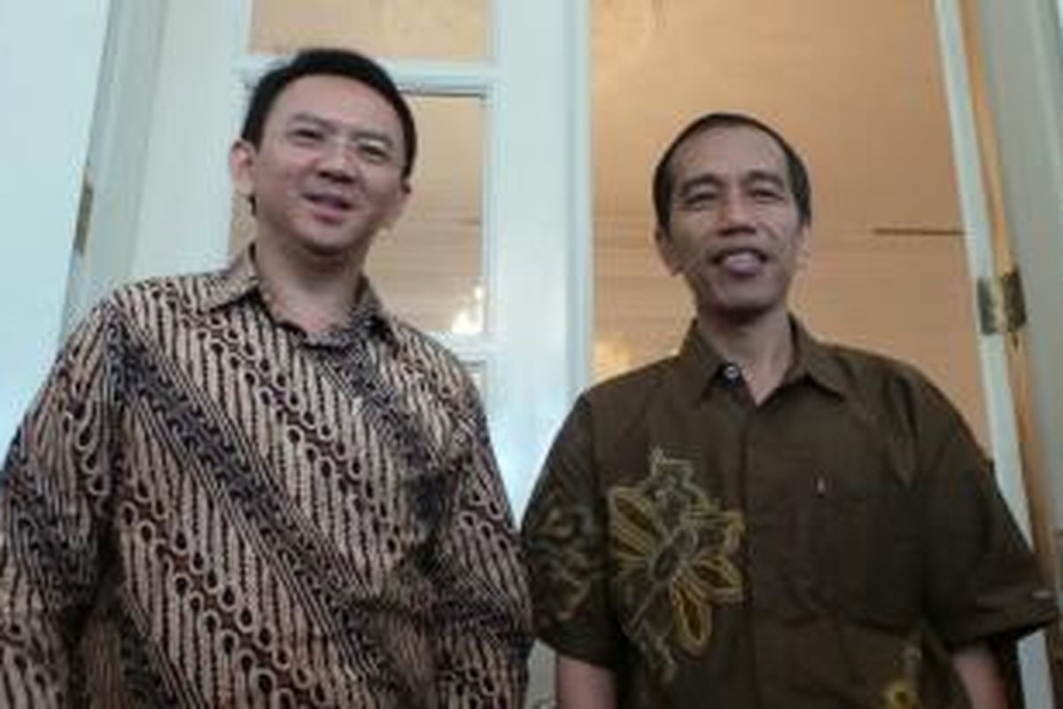 Basuki Tjahaja Purnama (kirim) dan Joko Widodo (kanan).