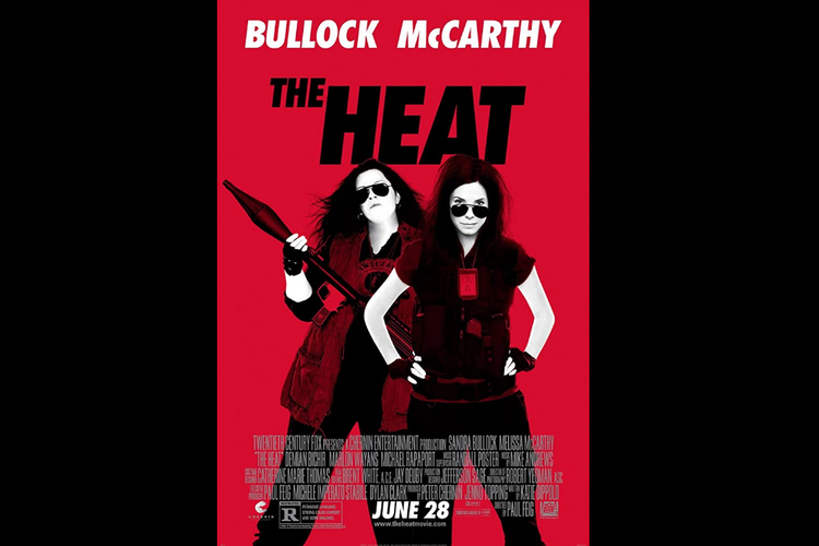 Sandra Bullock dan Melissa McCarthy dalam film komedi aksi The Heat (2013).