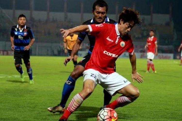 Pemain Persija Jakarta tampil dalam pertandingan melawan Madura United, Minggu (24/7/2016). 