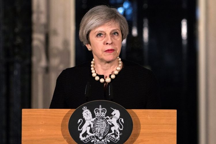 PM Inggris Theresa May saat memberikan pernyataan usai serangan teror di Gedung Parlemen, London, Rabu (22/3/2017).