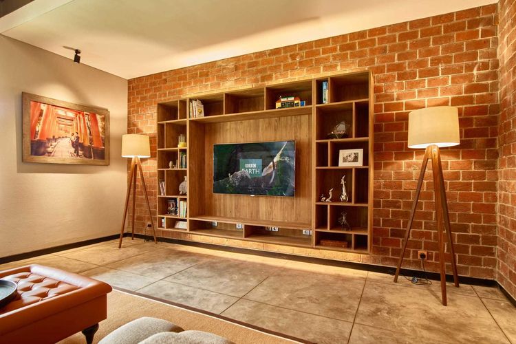 Ruang tv Budi Indah House karya Dinardithen Studio 