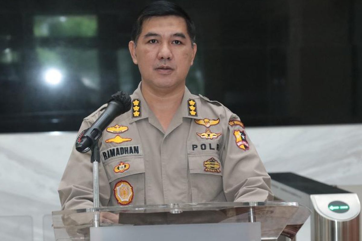 Police spokesman Ahmad Ramadhan delivers his speech at the National Police Headquarters in Jakarta. 