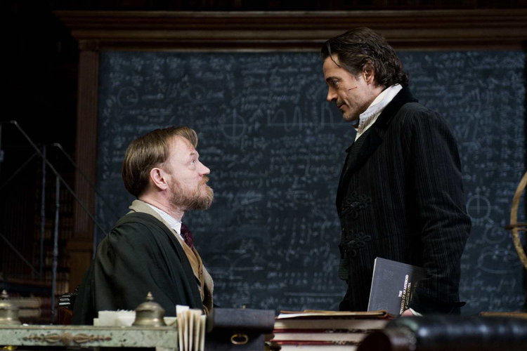 Robert Downey Jr. and Jared Harris in Sherlock Holmes: A Game of Shadows (2011)