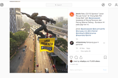 Kata Aktivis Greenpeace soal Aksinya Panjat dan Pasang Spanduk di Patung Pancoran
