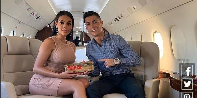 Cristiano Ronaldo bersama kekasihnya, Georgina Rodriguez.