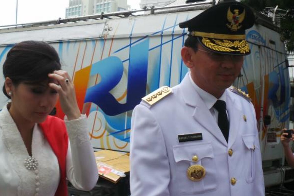 Basuki Tjahaja Purnama dan istrinya Veronica Tan di Istana Negara, Rabu (19/11/2014).