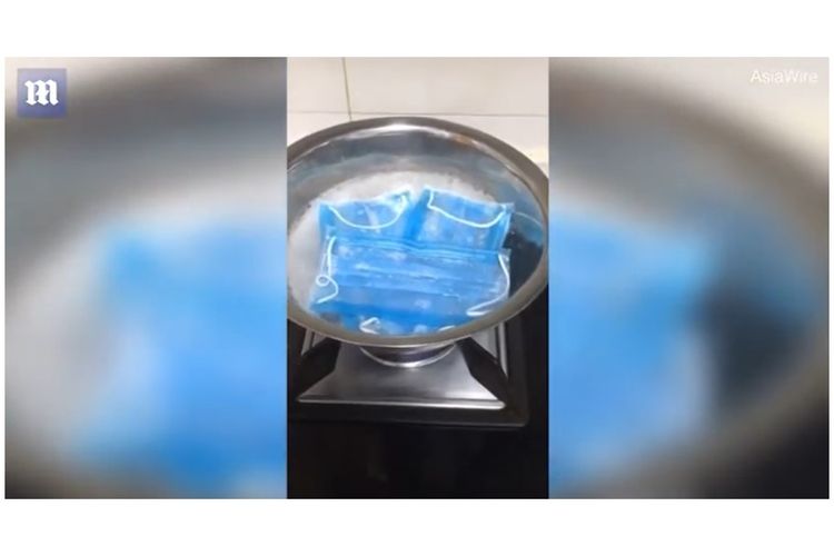 Beredar video yang menampilkan masker yang dicuci dengan cara direbus menggunakan air panas untuk digunakan kembali.