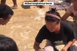 Korban Banjir Punguti Beras yang Dilempar dari Helikopter, Bupati Minta Maaf 