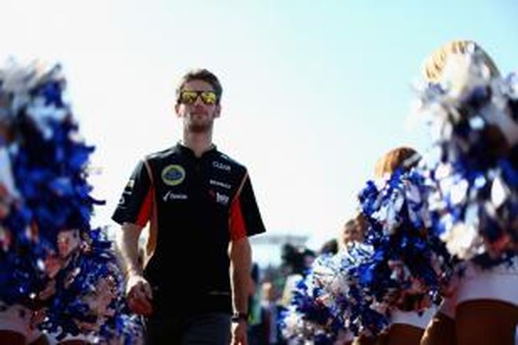 Pebalap Lotus asal Perancis, Romain Grosjean hadir pada parade pebalap jelang GP Amerika Serikat di Sirkuit The Americas, Minggu (17/11/2013).