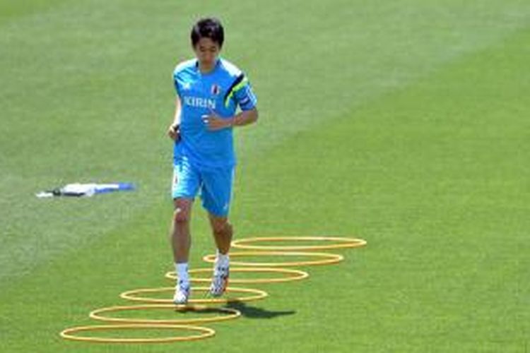 Gelandang Manchester United, Shinji Kagawa, mengikuti sesi latihan tim nasional Jepang, di Tokyo, pada 17 Mei 2014.
