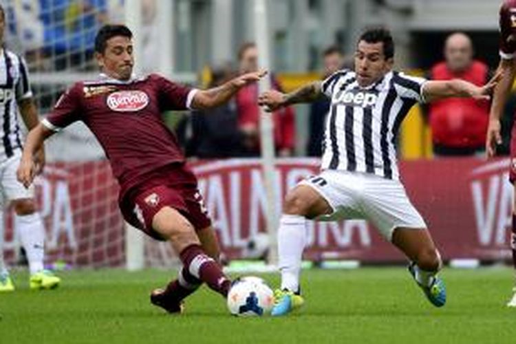 Penyerang Juventus Carlos Tevez.