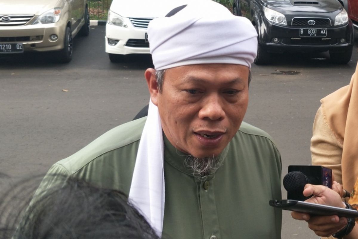 Muhammad Gatot Saptono alias Al Khaththath saat menyambangi Polda Metro Jaya, Jumat (4/5/2018).