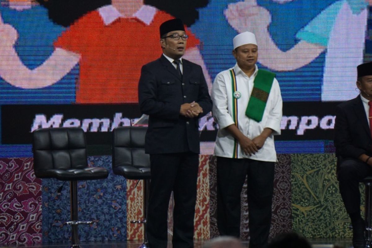 Pasangan calon Ridwan Kamil-Uu Ruzhanul Ulum dalam debat publik Pilgub Jabar terakhir, Jumat (22/6/2018).