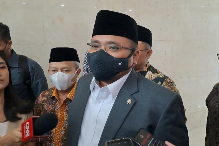 Indonesia's Religious Affairs Minister Yaqut Cholil Qoumas speaks to journalists on the sidelines of a working meeting with the House of Representatives Commission VIII overseeing social affairs in Jakarta on Thursday, January 19, 2023. 