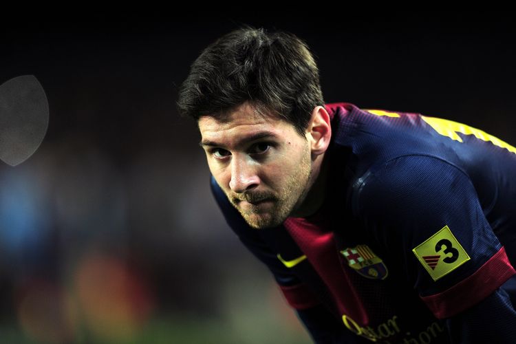 Lionel Messi saat memperkuat Barcelona melawan Atletico de Madrid dalam rangkaian laga Liga Spanyol di Camp Nou Stadium di Barcelona, pada 16 Desember 2012. 