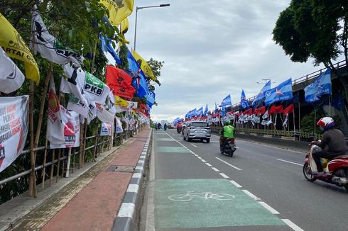 Warna-warni Bendera Parpol di Sepanjang Jalan Letjen S Parman hingga Gatot Subroto