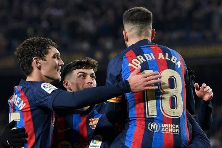 Para pemain Barcelona merayakan salah satu gol ke gawang Sevilla dalam laga lanjutan Liga Spanyol musim 2022-2023 di Stadion Camp Nou pada Senin (6/2/2023) dini hari WIB. Selanjutnya, laga Villarreal vs Barcelona bakal tersaji pada pekan ke-21 Liga Spanyol, Senin (13/2/2023) dini hari WIB.