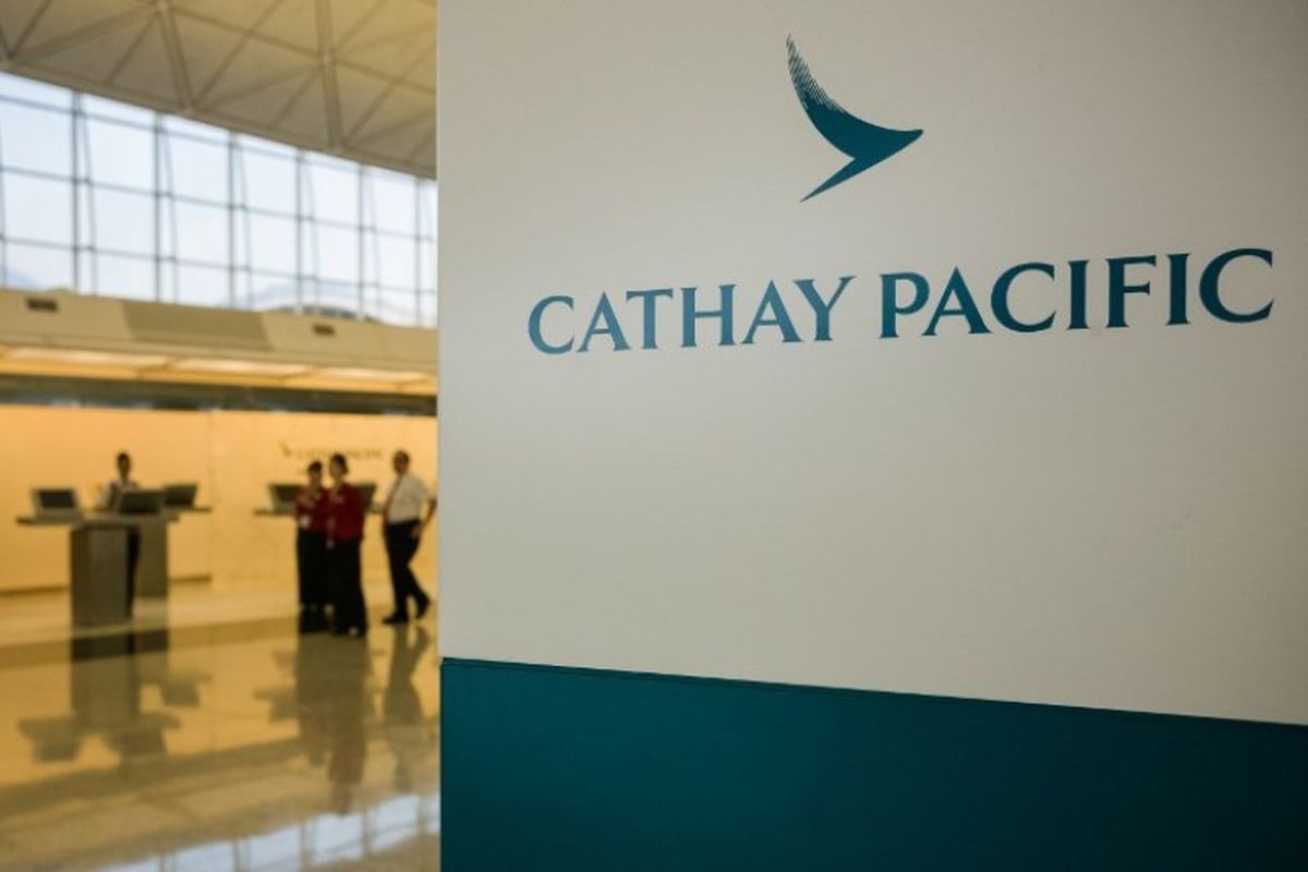 Ilustrasi Cathay Pacific. (AFP/ANTHONY WALLACE)