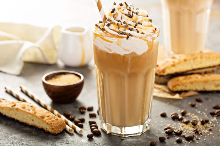 Ilustrasi es kopi  karamel atau caramel frappuccino.