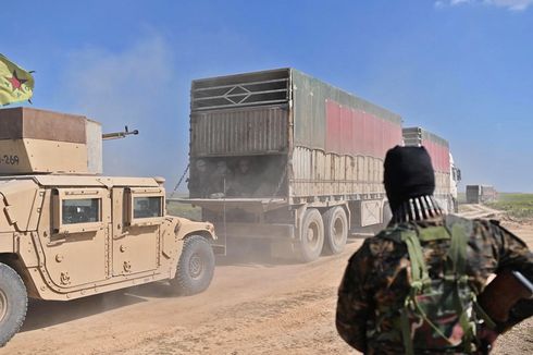 Konvoi Truk Warga Sipil Terlihat Keluar dari Wilayah Terakhir ISIS