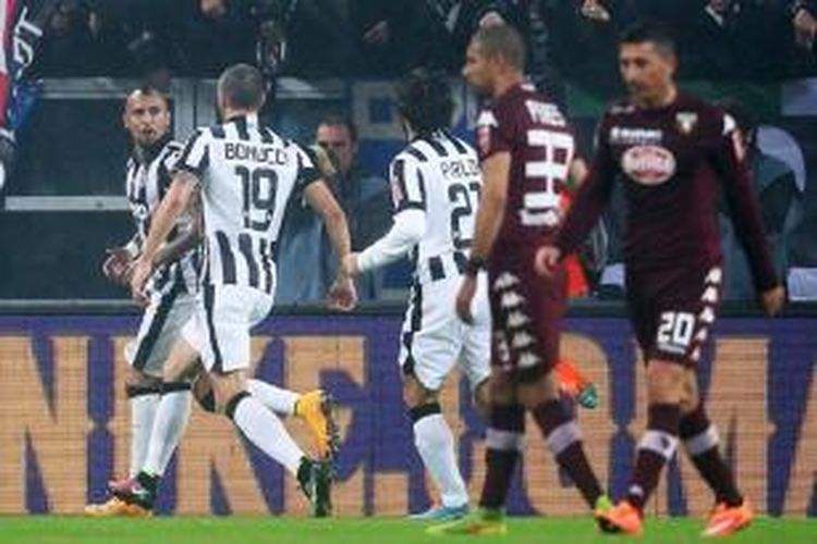 Para pemain Juventus merayakan gol ke gawang Torino pada laga Serie-A di Stadion Juventus, Turin, Minggu (30/11/2014).